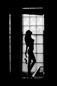 silhouette in window